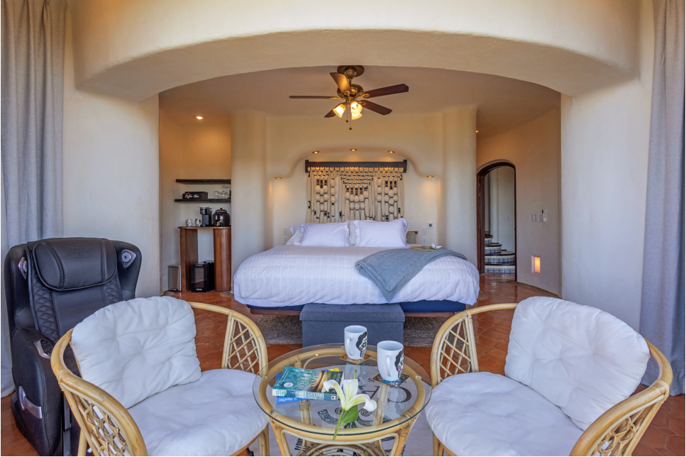 Luxurious king bed in the ocean-view master suite